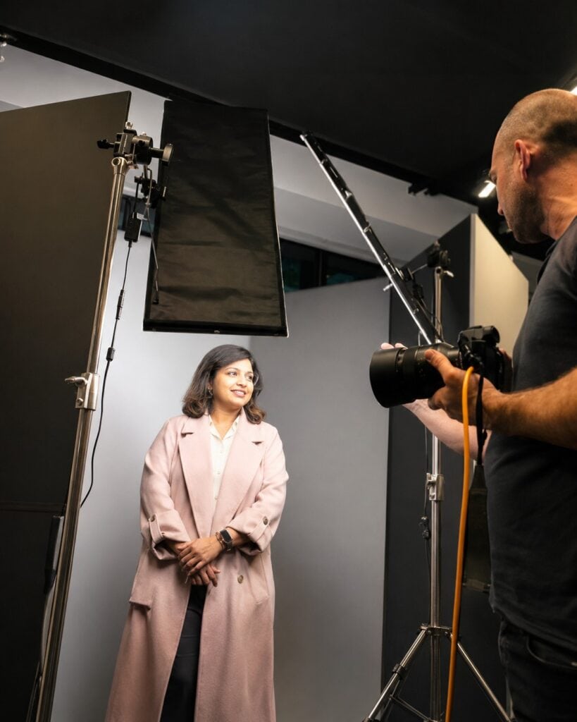 BTS of EMS Headshots working with a client