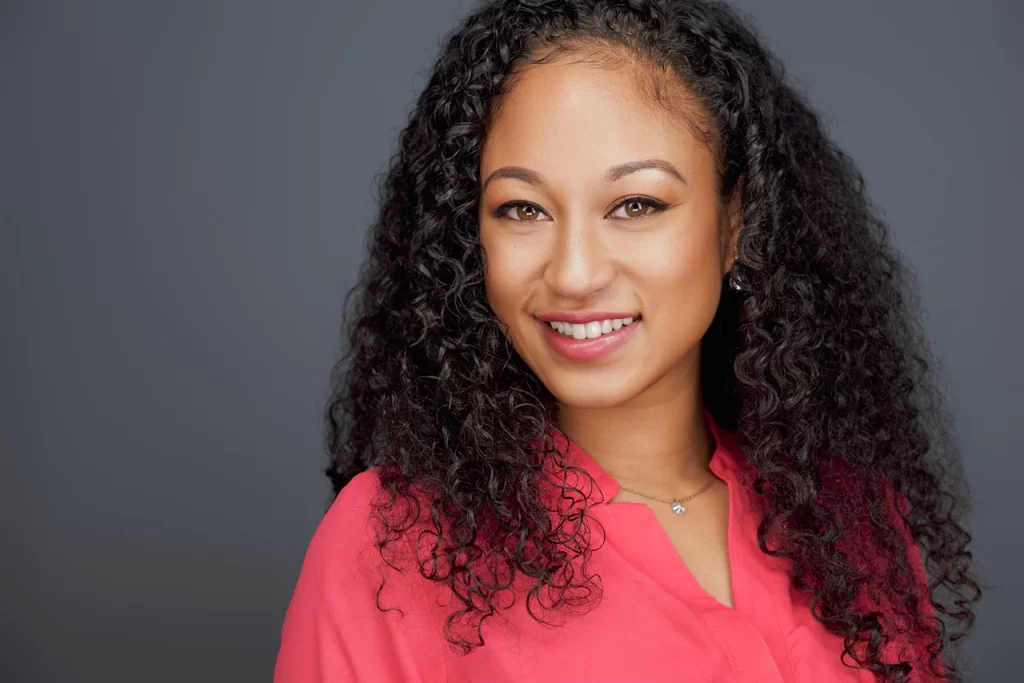 Real estate headshot San Francisco coral top