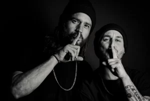Dave Abair posing in a dramatic black-and-white portrait.